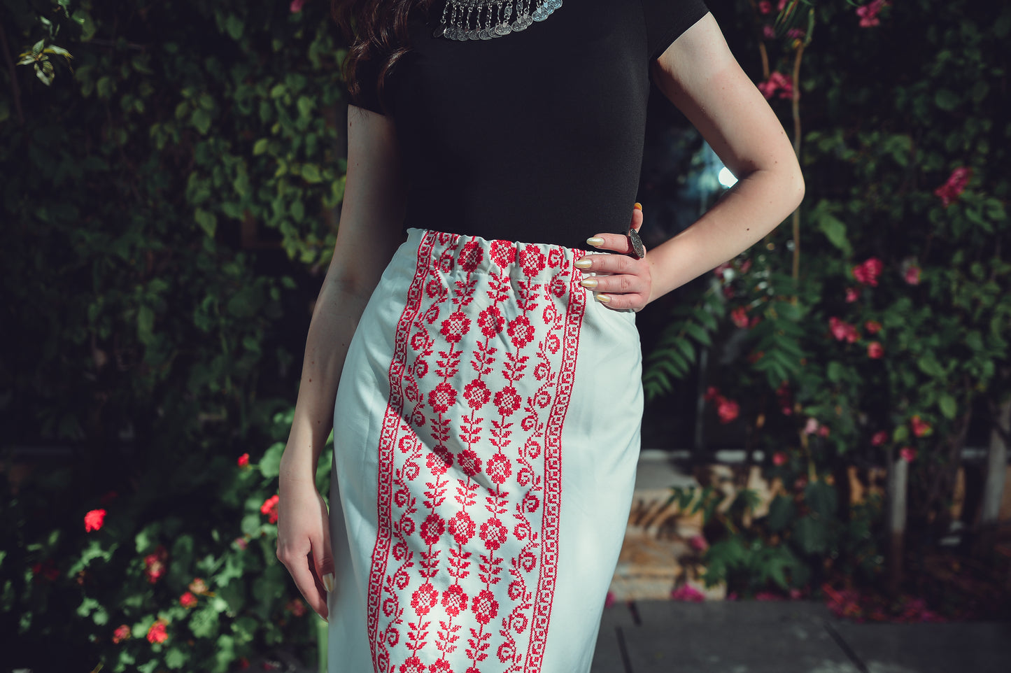 White Skirt with Red Embroidery – Front Detail