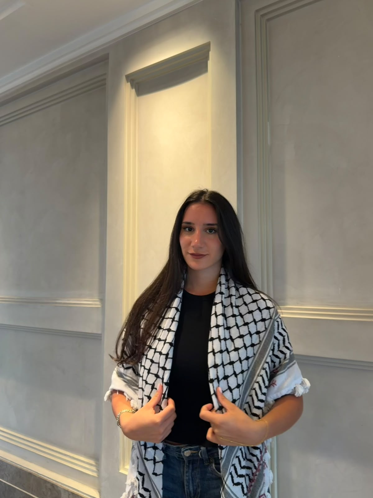 A hand-made embroidered Palestinian keffiyeh-shawl