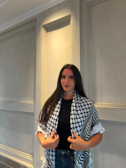 A hand-made embroidered Palestinian keffiyeh-shawl