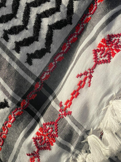 A hand-made embroidered Palestinian keffiyeh-shawl